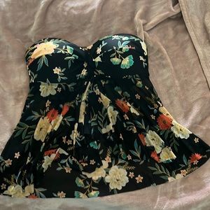 NEW never worn with tags. Tankini with removable straps; sheer mesh bottom